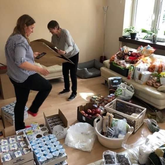 Copernicus4UA volunteers packing donations for distribution to displaced Ukrainians